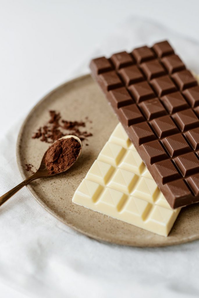 photo of sweet chocolates on plate